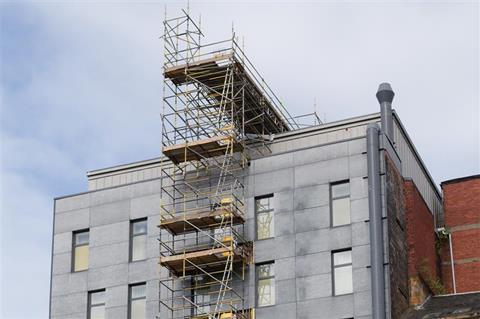 Scaffolding to facilitate work being done to the top of a high rise building